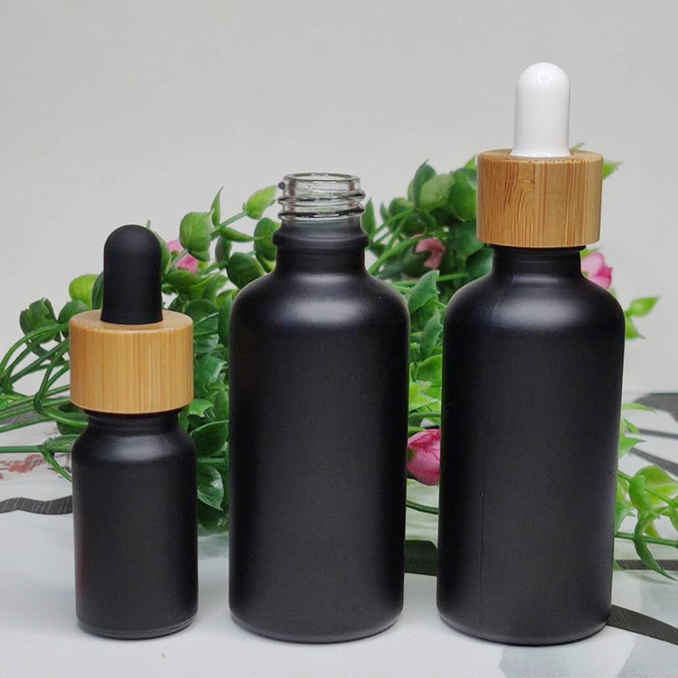 Black frosted glass bottle